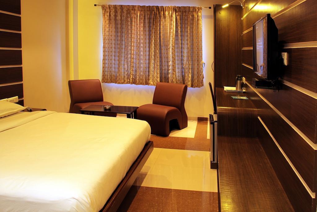 Hotel Sbs Grand Coimbatore Habitación foto